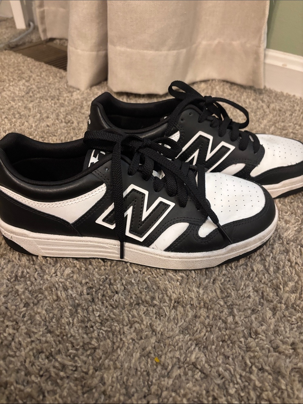 New Balance Black and White Low-Top Sneakers